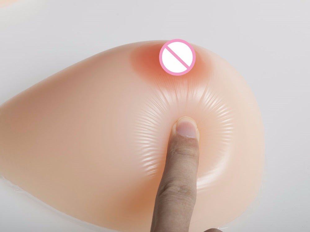 Formas de mama de silicona en forma de lágrima con sujetador de bolsillo negro