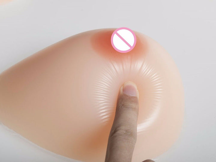 Formas de mama de silicona en forma de lágrima con sujetador de bolsillo negro