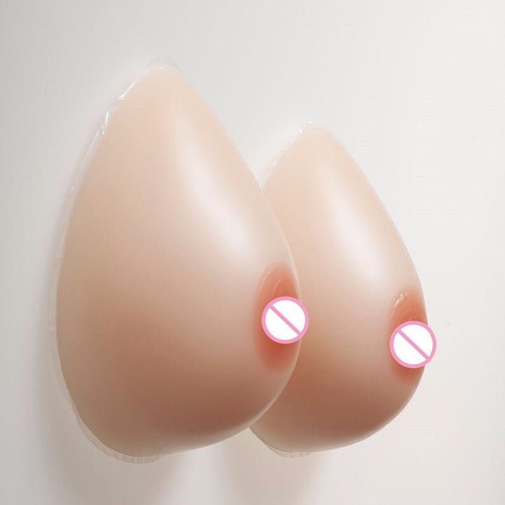 Formas de mama de silicona en forma de lágrima con sujetador de bolsillo negro 