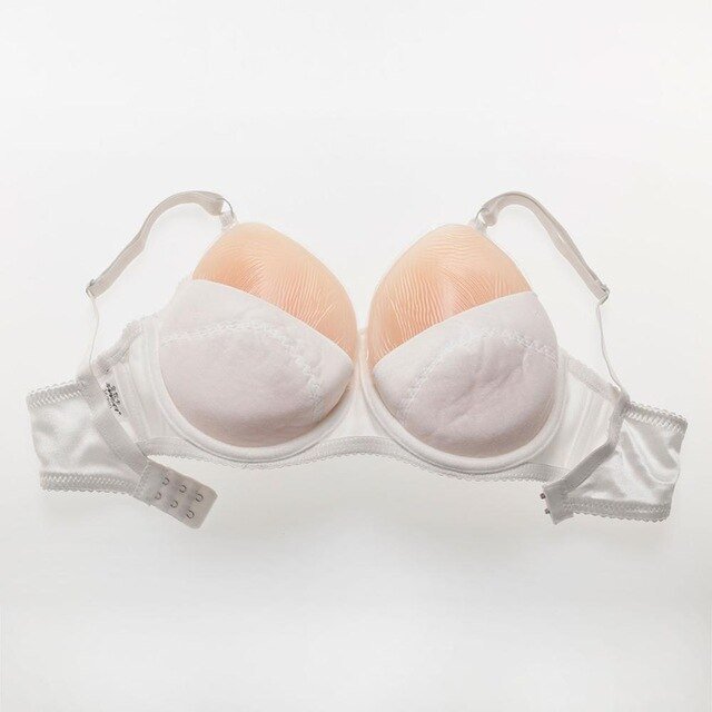 Formas de mama de silicona en forma de lágrima con sujetador de bolsillo blanco 